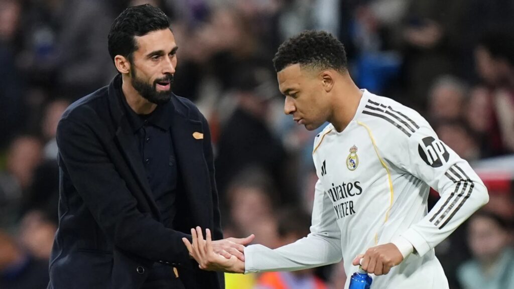 Real Madrid head coach Alvaro Arbeloa congratulates Kylian Mbappé after another goal for the club, highlighting the forward’s continued impact in attack.